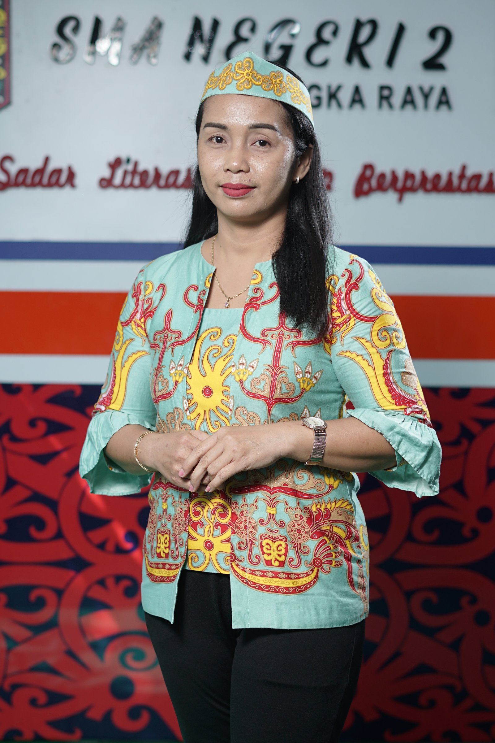 Yulanda Priskila Tinus, S.Pd