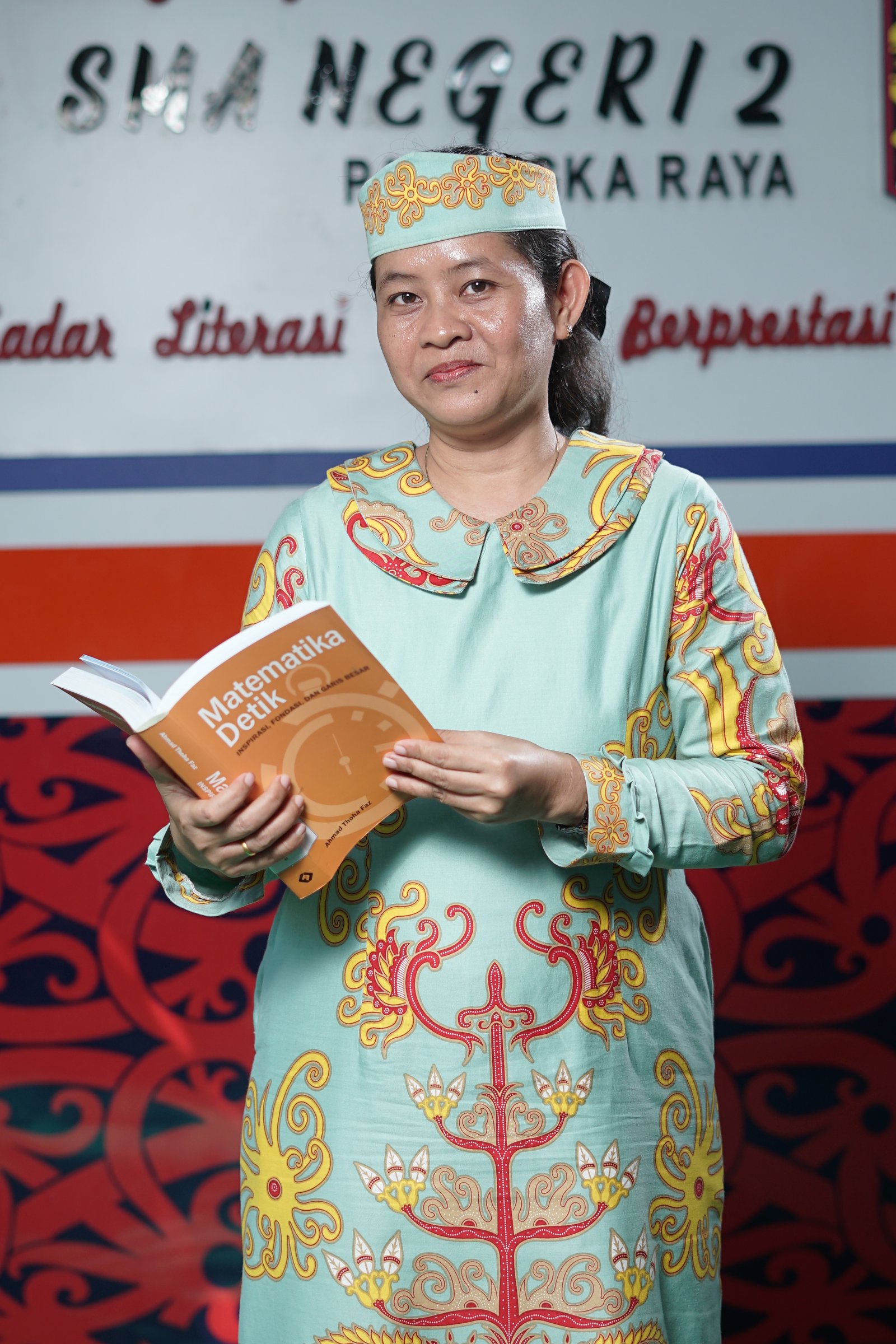 Martina T.H. Suriani, S.Pd